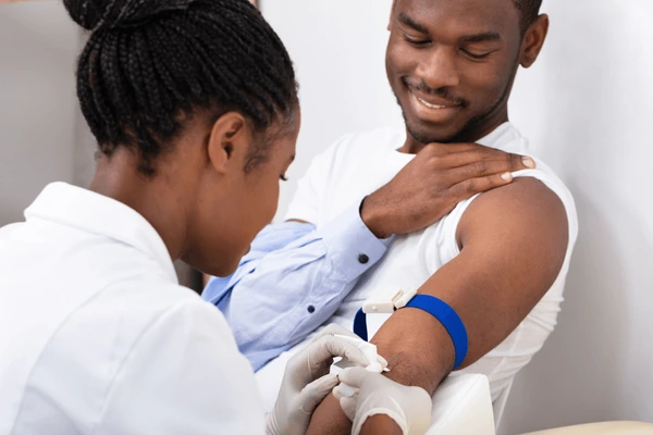 closeup female doctor injecting male 600nw 1403753498